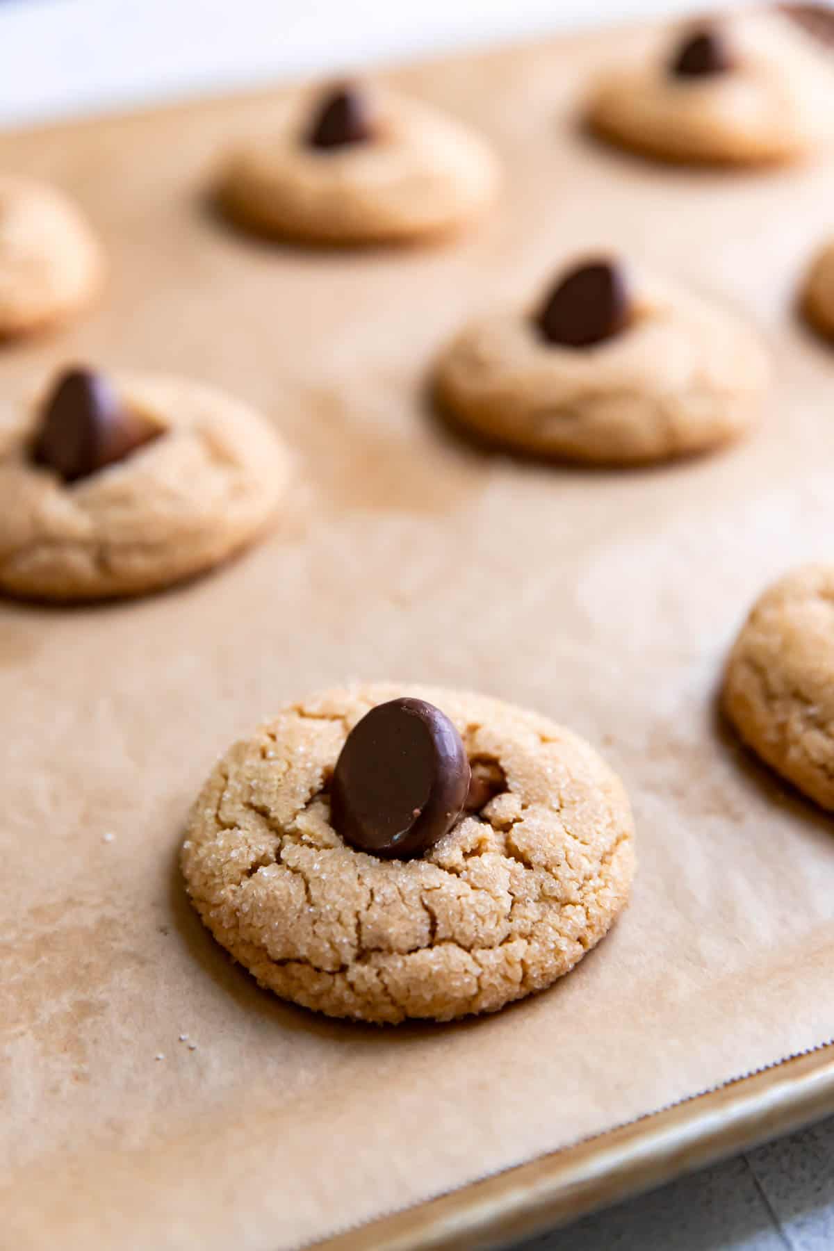 peanut butter cookies with a hershey kiss sideways on top.
