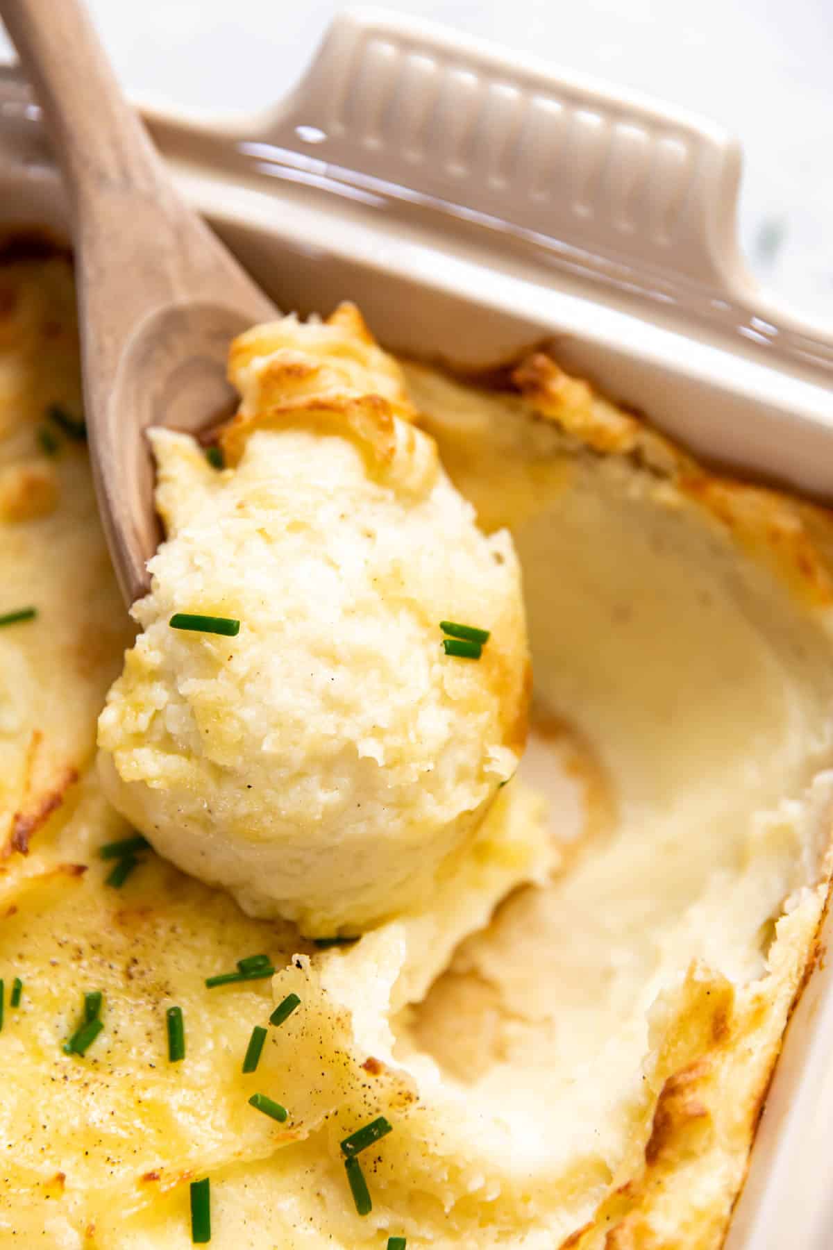 baked mashed potatoes in a baking dish.