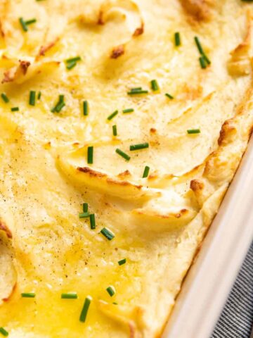 baked mashed potatoes in a baking dish.