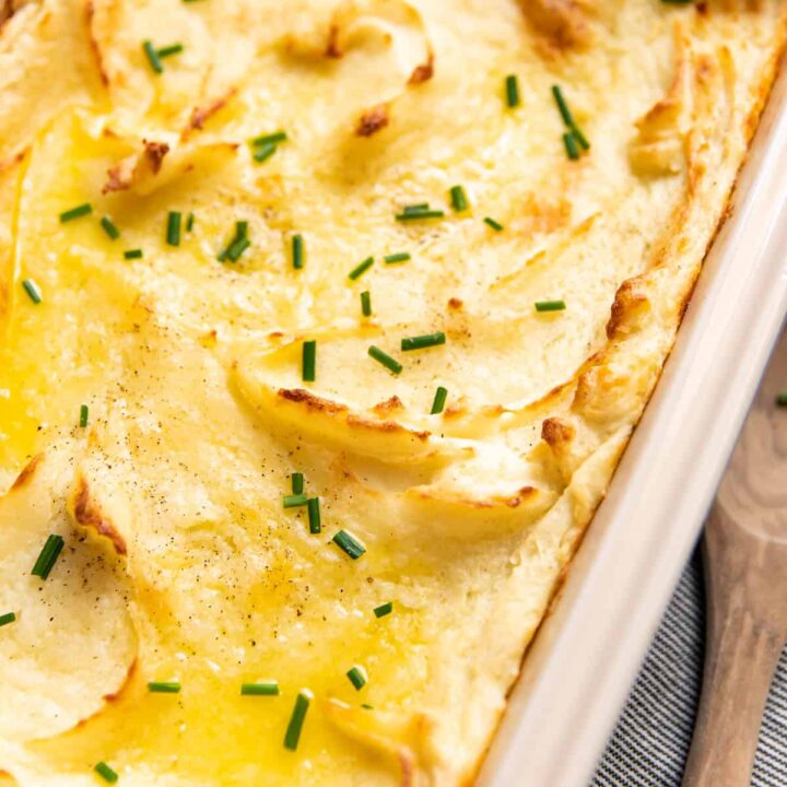 baked mashed potatoes in a baking dish.