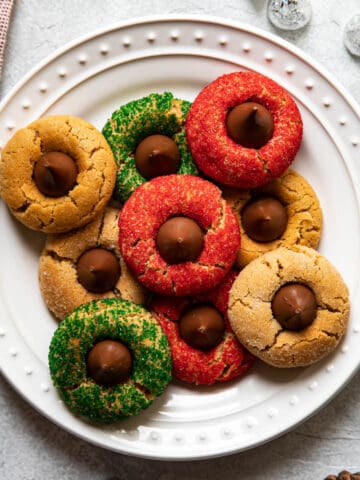 christmas peanut butter blossoms on a plate.