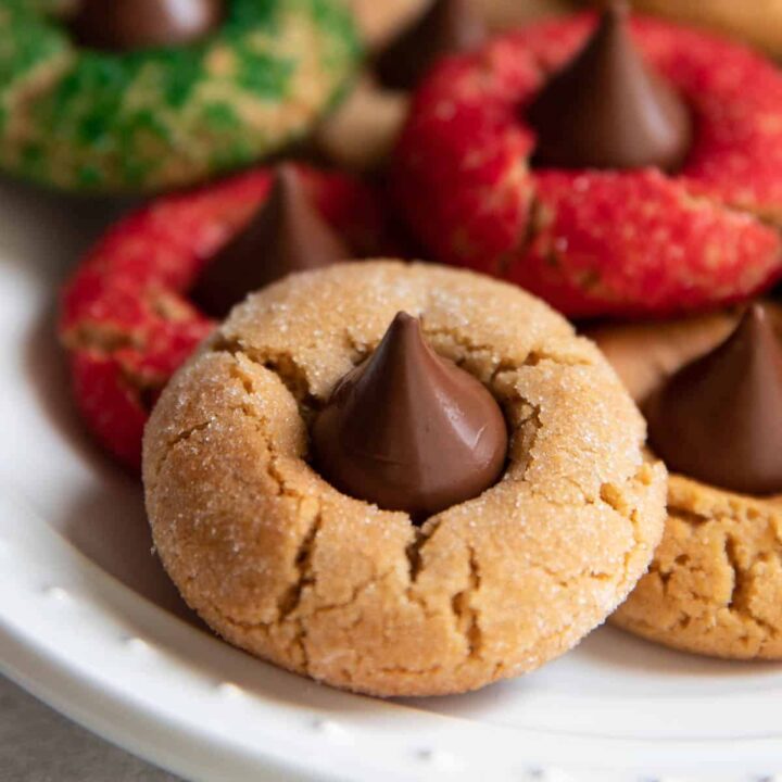 christmas peanut butter blossoms on a plate.