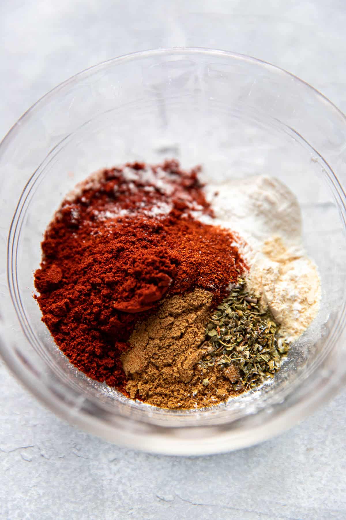 red enchilada sauce spices in a bowl.