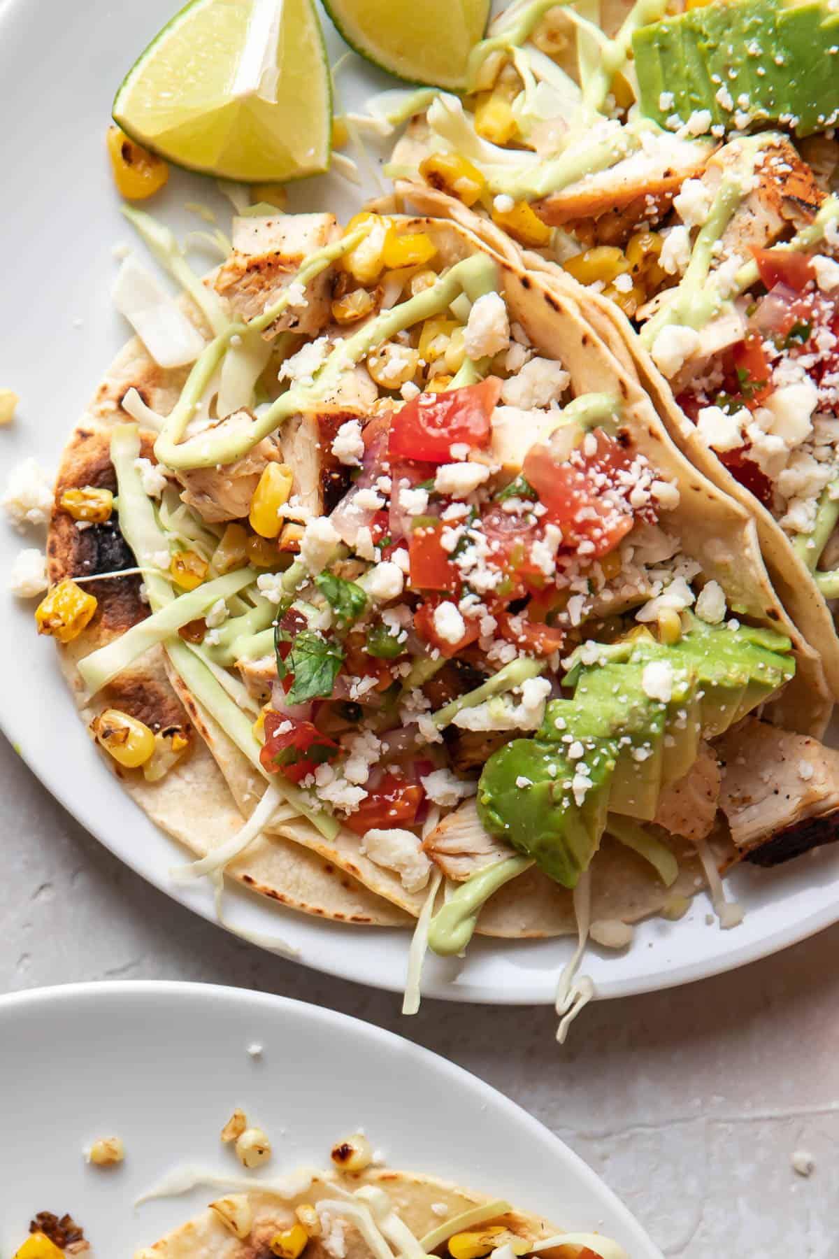 blackened chicken tacos on a plate.