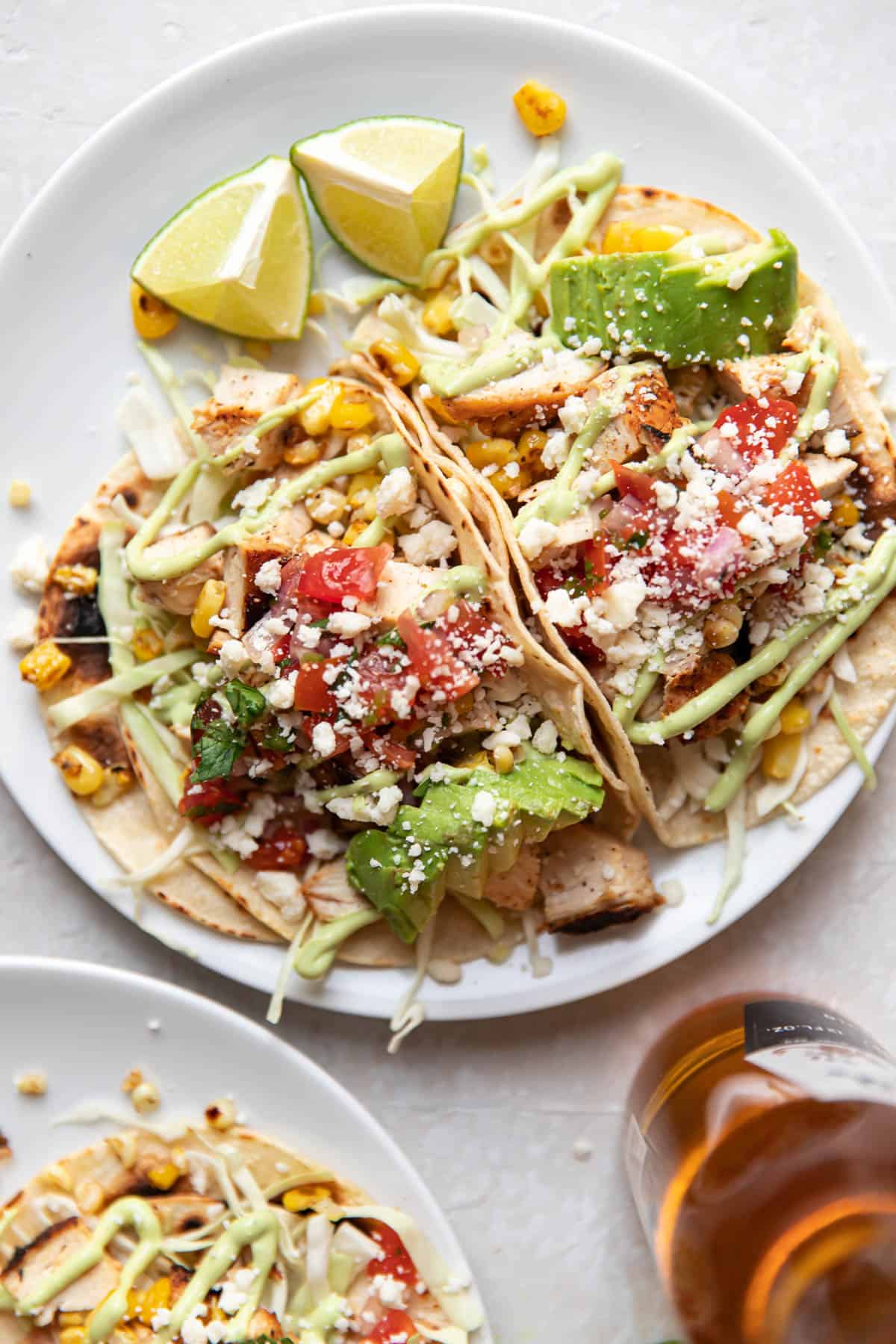 blackened chicken tacos on a plate.