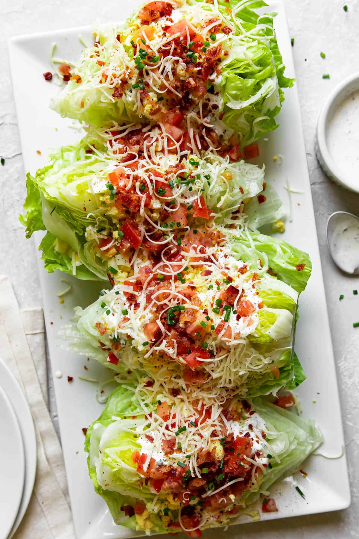 blt wedge salad on a plate.