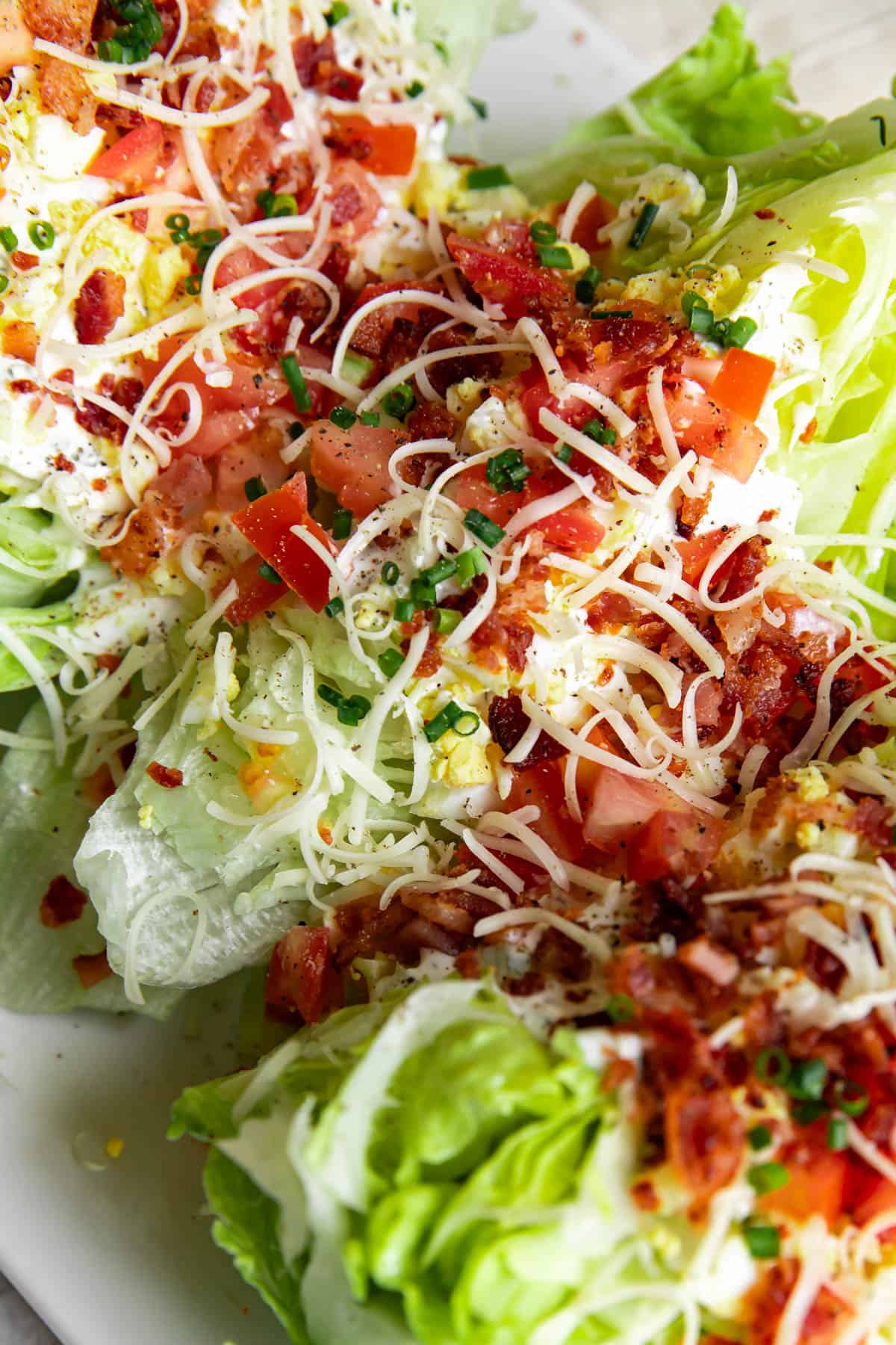 blt wedge salad on a plate.