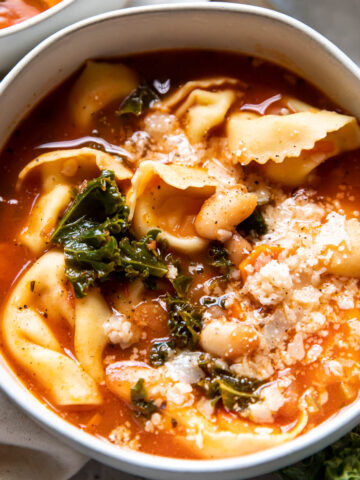 tuscan tortellini soup in a bowl.