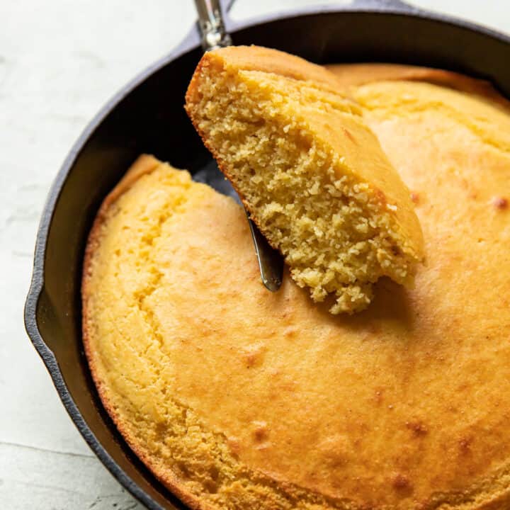 cornbread in a skillet after baking in the oven.