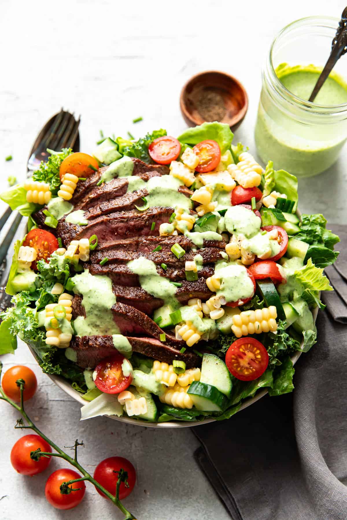 salad with steak and greed goddess dressing.