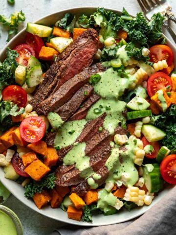 steak salad in a bowl.